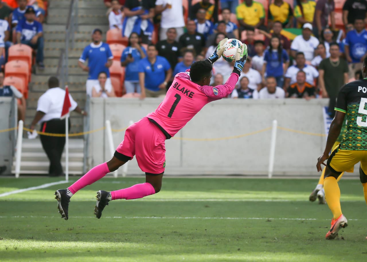 HOUSTON, TX - JUNE 21: Jamaica goalkeeper Andre Blake (1) traps shot on goal during the CONCACAF Gold Cup Group C match between Jamaica and El Salvador on June 21, 2019 at BBVA Stadium in Houston, Texas. (Photo by Leslie Plaza Johnson/Icon Sportswire via Getty Images)