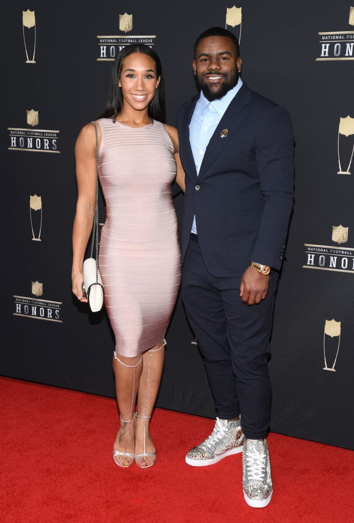 Mark Ingram (derecha) - Running back, New Orleans Saints. Lo acompaña su esposa.