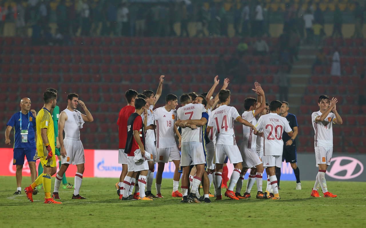 Spain's soccer players celebrate after winning their FIFA U-17 World Cup match over France in Gauhati, India, Tuesday, Oct. 17, 2017. (AP Photo/Anupam Nath)