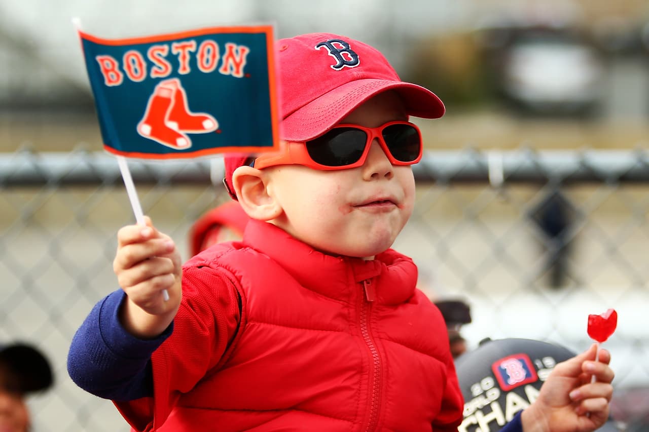 BOSTON, MA - OCTOBER 31: A young fan cheers during the 2018 Boston Red Sox World Series victory parade on October 31, 2018 in Boston, Massachusetts. (Photo by Adam Glanzman/Getty Images)