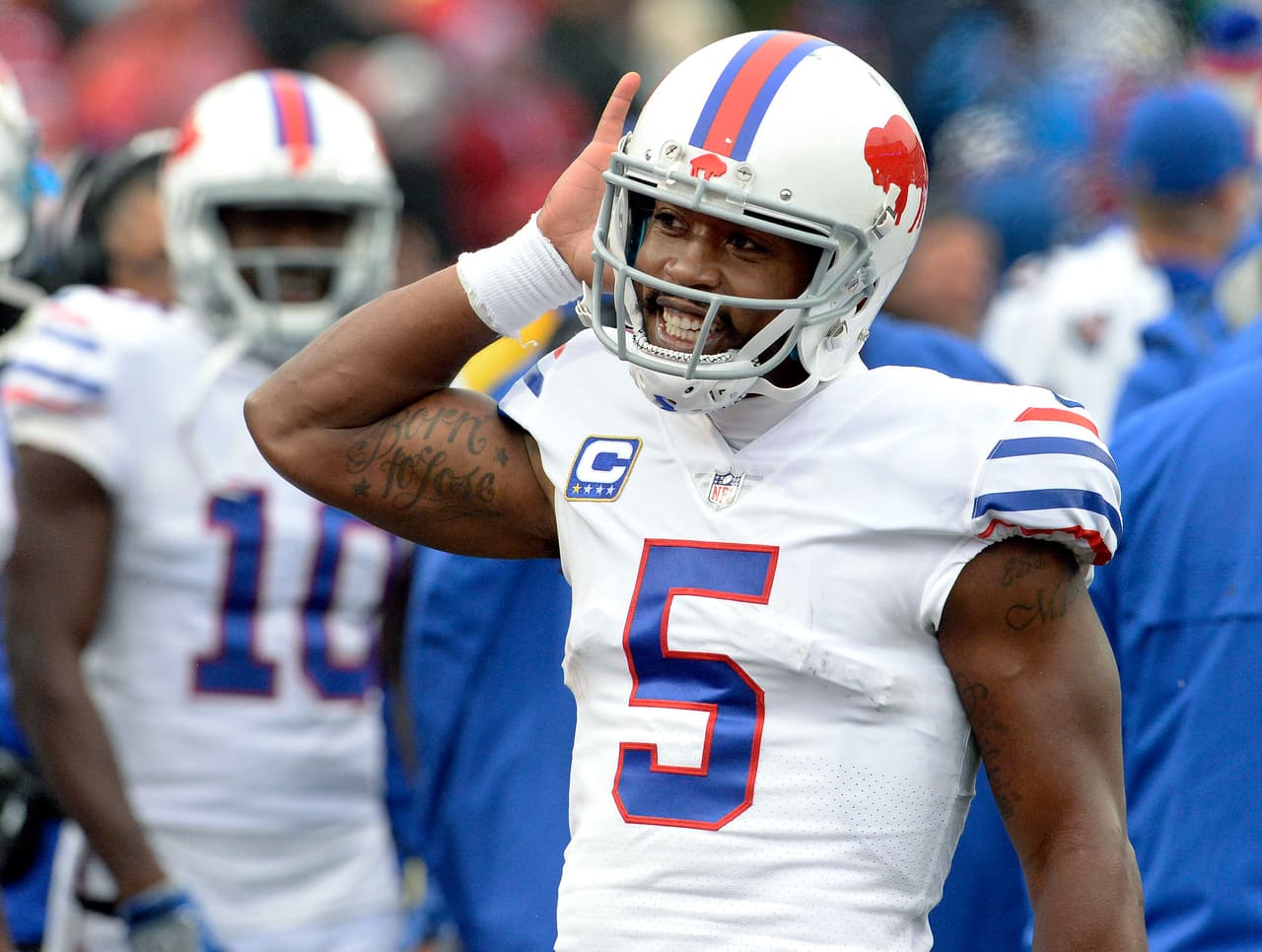 Buffalo Bills quarterback Tyrod Taylor (5) gestures to the crowd after a Bills touchdown during the second half of an NFL football game against the Oakland Raiders, Sunday, Oct. 29, 2017, in Orchard Park, N.Y. Buffalo beat Oakland 34-14. (AP Photo/Adrian Kraus)