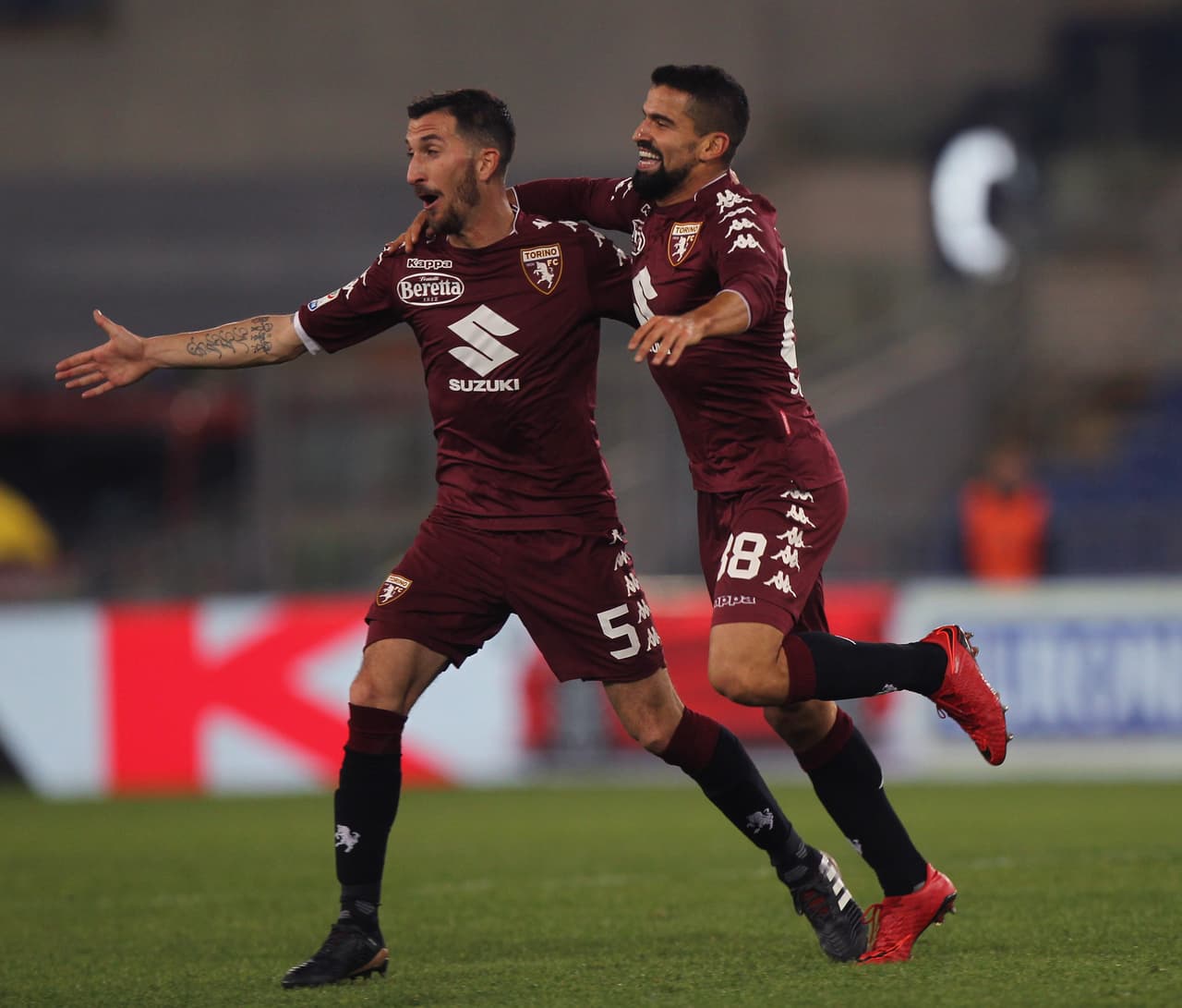 ROME, ITALY - DECEMBER 11: Tomas Rincon #88 with his teammates of Torino FC celebrates after scoring the team's second goal during the Serie A match between SS Lazio and Torino FC at Stadio Olimpico on December 11, 2017 in Rome, Italy. (Photo by Paolo Bruno/Getty Images)