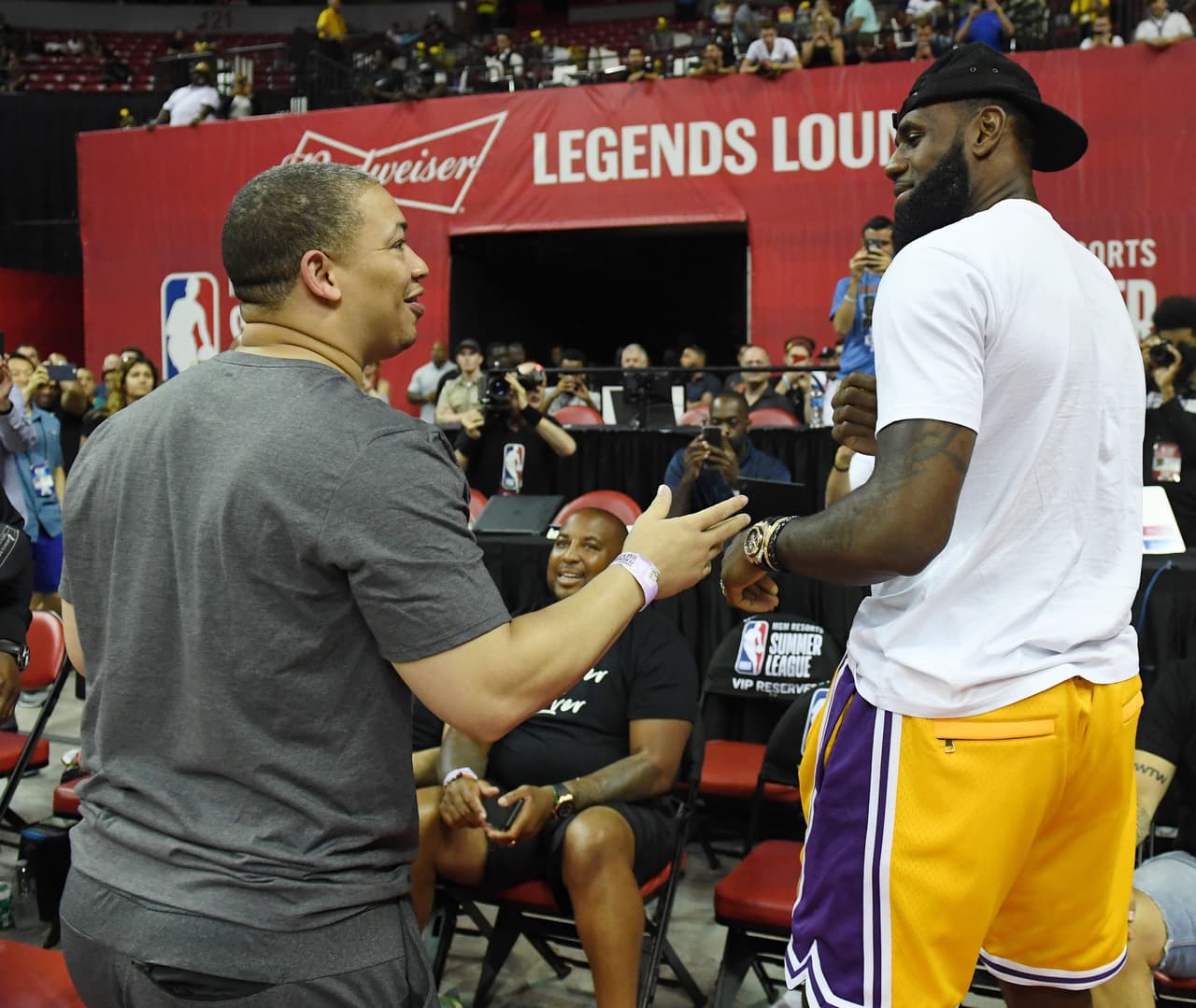LAS VEGAS, NV - JULY 15: Head coach Tyronn Lue (L) of the Cleveland Cavaliers greets LeBron James of the Los Angeles Lakers after a quarterfinal game of the 2018 NBA Summer League between the Lakers and the Detroit Pistons at the Thomas & Mack Center on July 15, 2018 in Las Vegas, Nevada. NOTE TO USER: User expressly acknowledges and agrees that, by downloading and or using this photograph, User is consenting to the terms and conditions of the Getty Images License Agreement. (Photo by Ethan Miller/Getty Images)