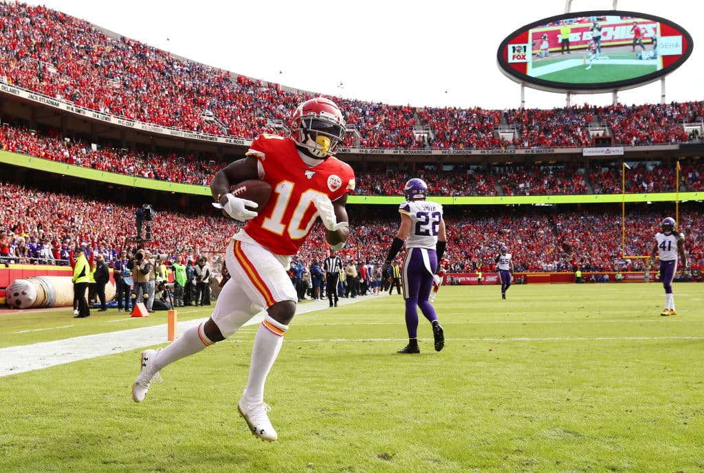 KANSAS CITY, MISSOURI - NOVEMBER 03: Tyreek Hill #10 of the Kansas City Chiefs celebrates catching a 40-yard touchdown pass against the Minnesota Vikings during the first quarter at Arrowhead Stadium on November 03, 2019 in Kansas City, Missouri. (Photo by Jamie Squire/Getty Images)