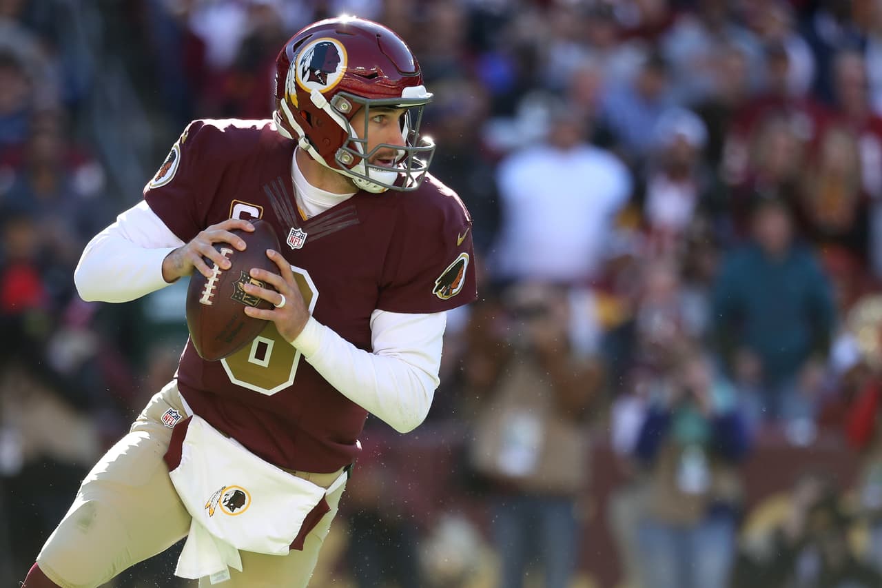 LANDOVER, MD - NOVEMBER 13: Quarterback Kirk Cousins #8 of the Washington Redskins looks to pass against the Minnesota Vikings in the first quarter at FedExField on November 13, 2016 in Landover, Maryland. (Photo by Rob Carr/Getty Images)