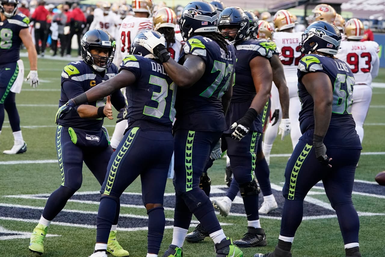 Jimmy Garoppolo vulve a salir lesionado en la derrota 27-37 fente a los Seattle Seahawks.