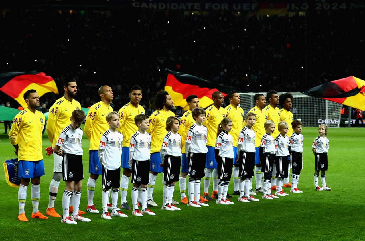 BERLIN, GERMANY - MARCH 27: The Brazil team sing their national anthem prior to the International friendly between Germany and Brazil at Olympiastadion on March 27, 2018 in Berlin, Germany. (Photo by Martin Rose/Bongarts/Getty Images)