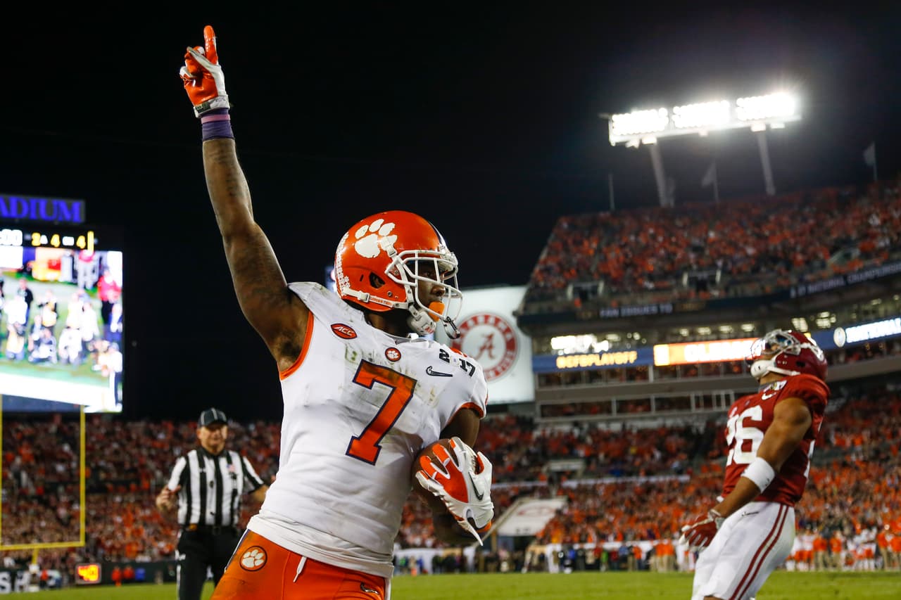 Clemson Tigers wide receiver Mike Williams (7) reacts after scoring a touchdown in the second half as Alabama Crimson Tide defensive back Marlon Humphrey (26) looks on during the NCAA Playoff National Championship game, Monday, Jan. 9th, 2017 in Tampa,fl. (Logan Bowles via AP Images)