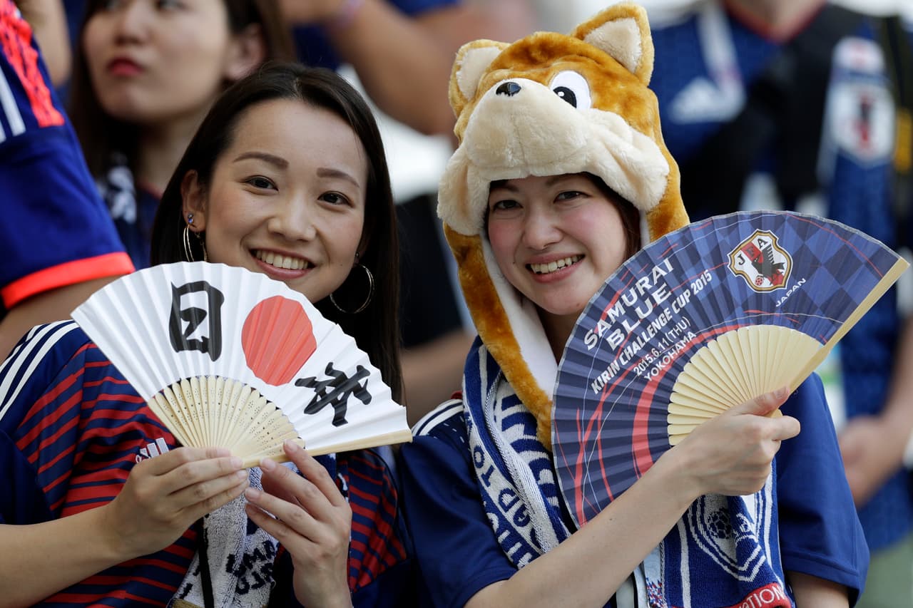 Japanese fans pose before the start of the group H match between Japan and Poland at the 2018 soccer World Cup at the Volgograd Arena in Volgograd, Russia, Thursday, June 28, 2018. (AP Photo/Andrew Medichini)