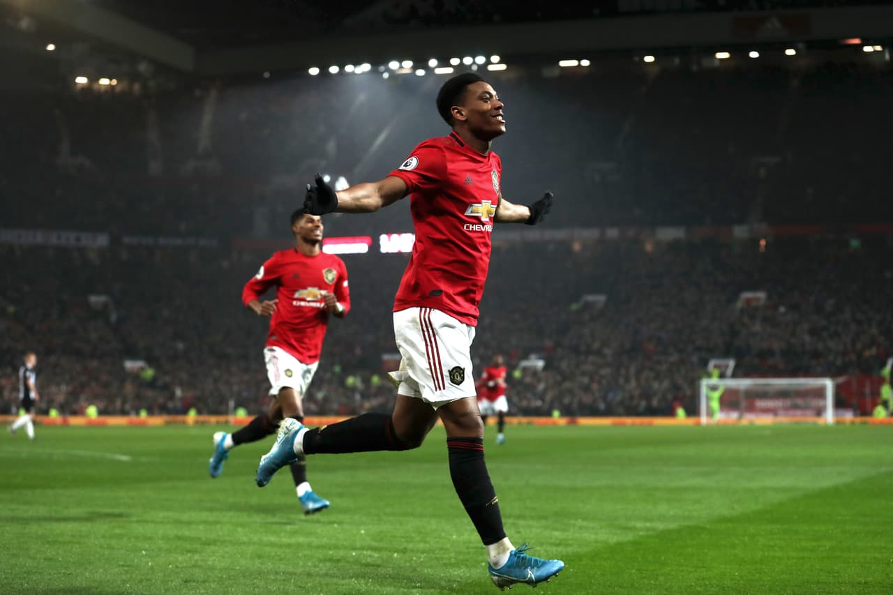 MANCHESTER, ENGLAND - DECEMBER 26: Anthony Martial of Manchester United celebrates scoring his team's fourth goal during the Premier League match between Manchester United and Newcastle United at Old Trafford on December 26, 2019 in Manchester, United Kingdom. (Photo by Ian MacNicol/Getty Images)