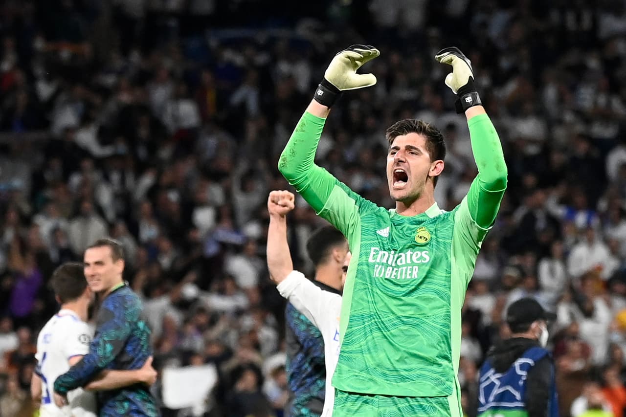 Real Madrid's Belgian goalkeeper Thibaut Courtois celebrates at the end of the UEFA Champions League semi-final second leg football match between Real Madrid CF and Manchester City at the Santiago Bernabeu stadium in Madrid on May 4, 2022. (Photo by PIERRE-PHILIPPE MARCOU / AFP) (Photo by PIERRE-PHILIPPE MARCOU/AFP via Getty Images)