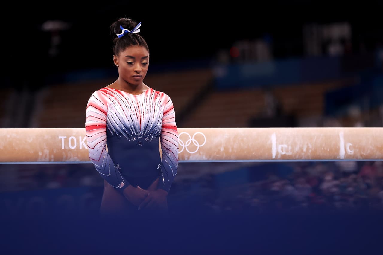 TOKYO, JAPAN - AUGUST 03: Simone Biles of Team United States competes in the Women's Balance Beam Final on day eleven of the Tokyo 2020 Olympic Games at Ariake Gymnastics Centre on August 03, 2021 in Tokyo, Japan. (Photo by Laurence Griffiths/Getty Images)