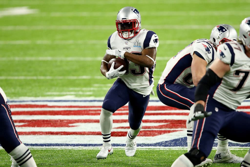 MINNEAPOLIS, MN - FEBRUARY 04: Dion Lewis #33 of the New England Patriots runs the ball against the Philadelphia Eagles during the second quarter in Super Bowl LII at U.S. Bank Stadium on February 4, 2018 in Minneapolis, Minnesota. (Photo by Gregory Shamus/Getty Images)