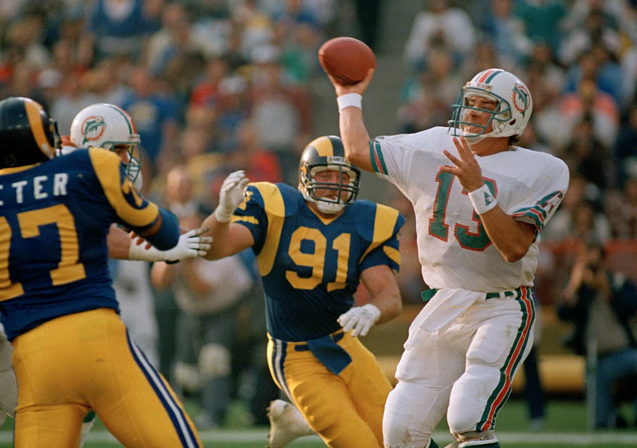 3.- Dan Marino.- 61,361 yardas.