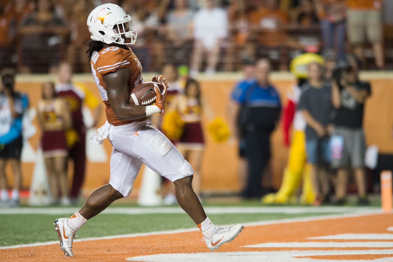 AUSTIN, TX - OCTOBER 15: D'Onta Foreman #33 of the Texas Longhorns breaks free for an 18 yard touchdown run against the Iowa State Cyclones during the second half on October 15, 2016 at Darrell K Royal-Texas Memorial Stadium in Austin, Texas. (Photo by Cooper Neill/Getty Images)