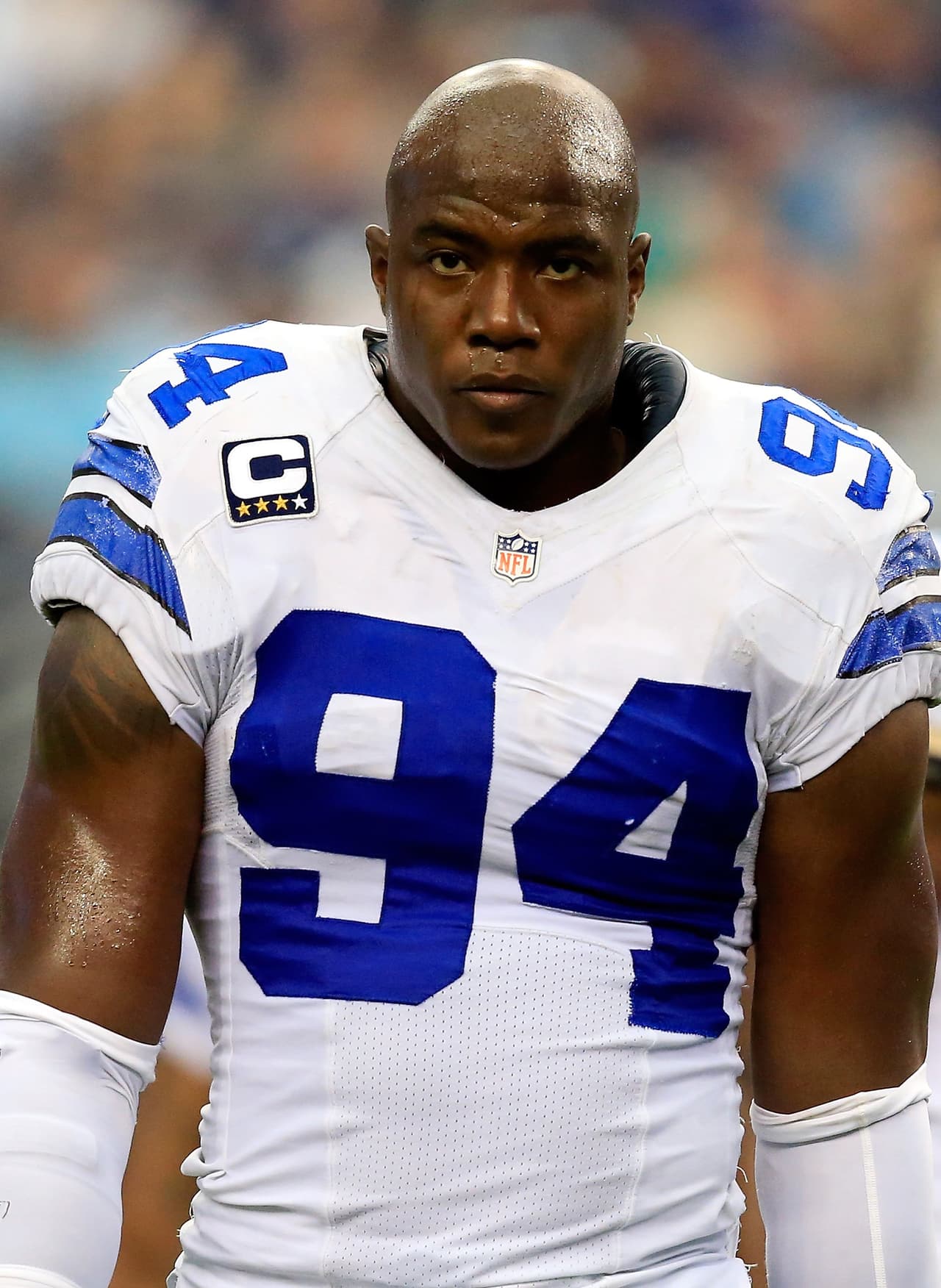 ARLINGTON, TX - SEPTEMBER 22: Defensive end DeMarcus Ware #94 of the Dallas Cowboys walks onto the field during the game against the St. Louis Rams at AT&T Stadium on September 22, 2013 in Arlington, Texas. (Photo by Jamie Squire/Getty Images)