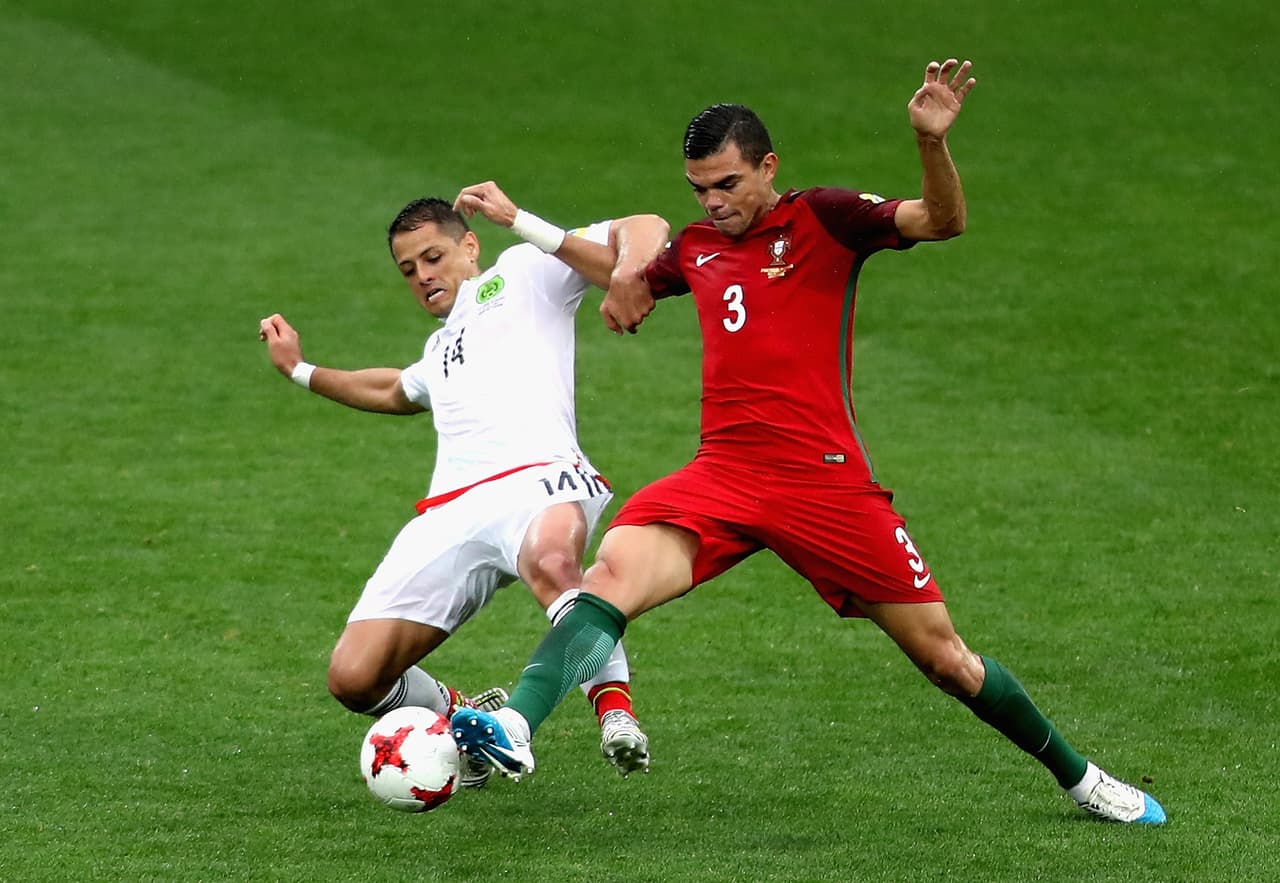 MOSCOW, RUSSIA - JULY 02: Javier Hernandez of Mexico and Pepe of Portugal battle for possession during the FIFA Confederations Cup Russia 2017 Play-Off for Third Place between Portugal and Mexico at Spartak Stadium on July 2, 2017 in Moscow, Russia. (Photo by Francois Nel/Getty Images)