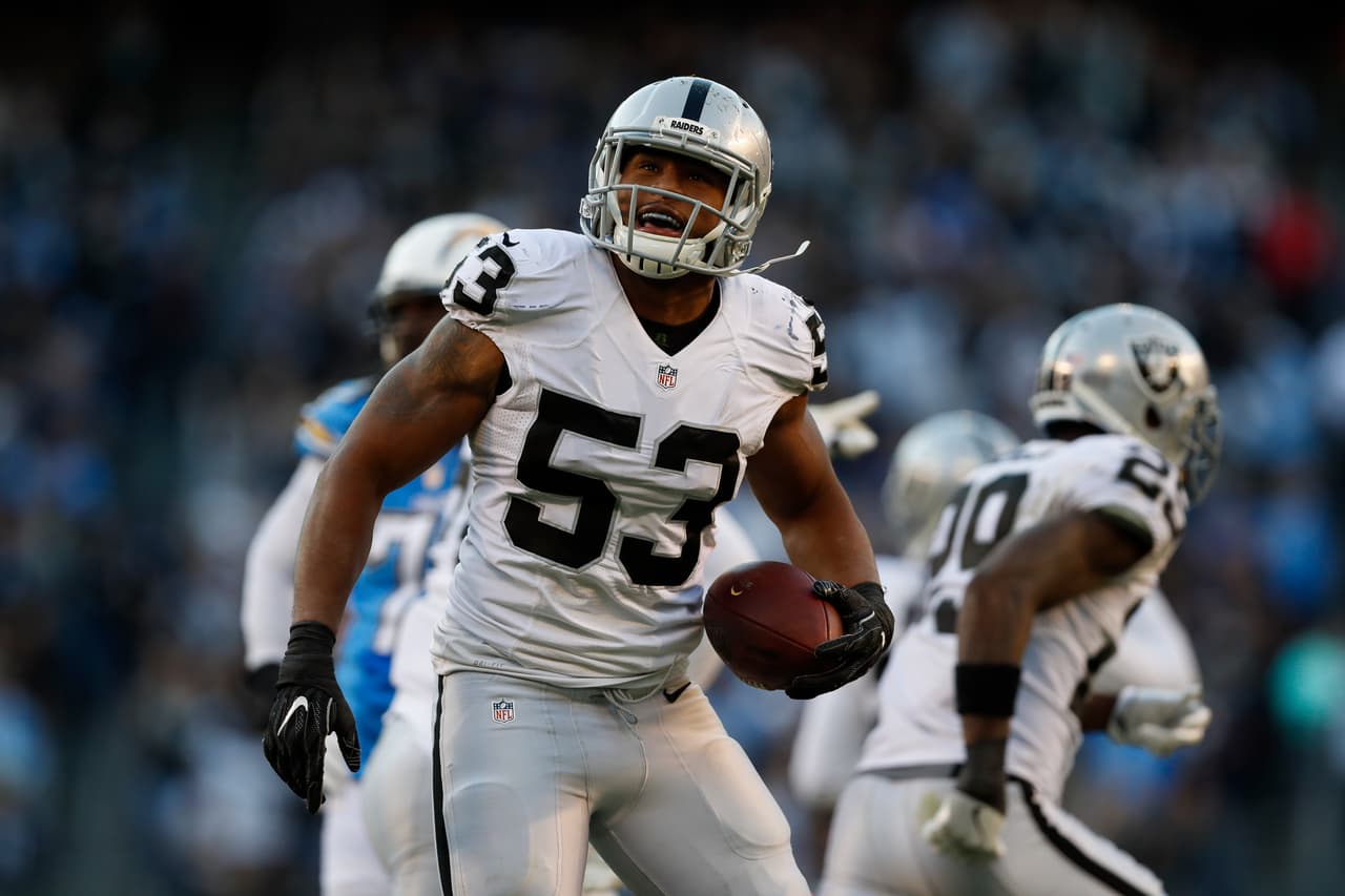 Oakland Raiders outside linebacker Malcolm Smith (53) celebrates during an NFL football game against the San Diego Chargers on Sunday, Dec. 18, 2016 in San Diego. Oakland won 19-16. (Aaron M. Sprecher via AP)