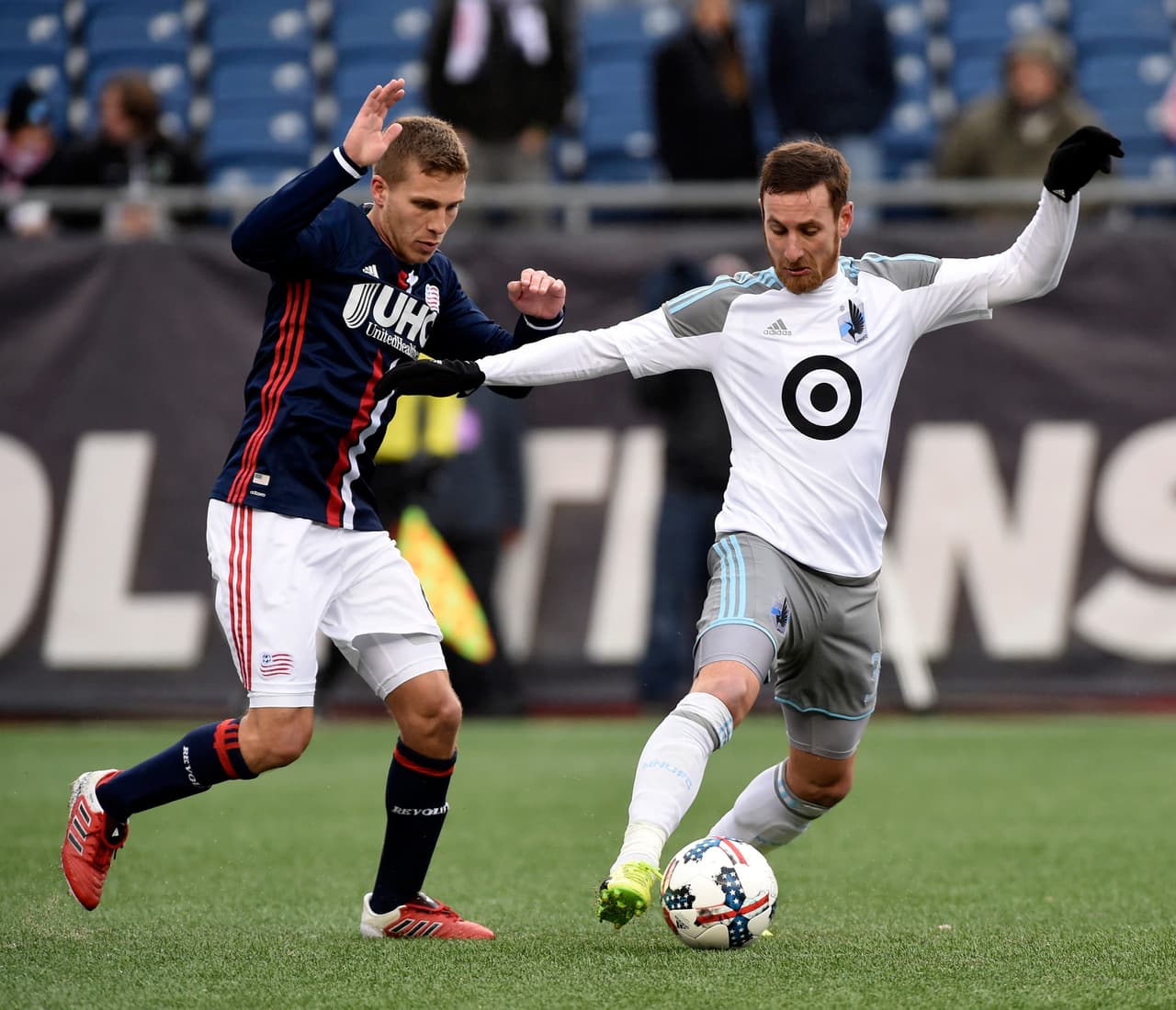 Mar 25, 2017; Foxborough, MA, USA; Minnesota United midfielder Jerome Thiesson (3) and New England Revolution midfielder Scott Caldwell (6) battle for the ball during the second half at Gillette Stadium. Mandatory Credit: Bob DeChiara-USA TODAY Sports
