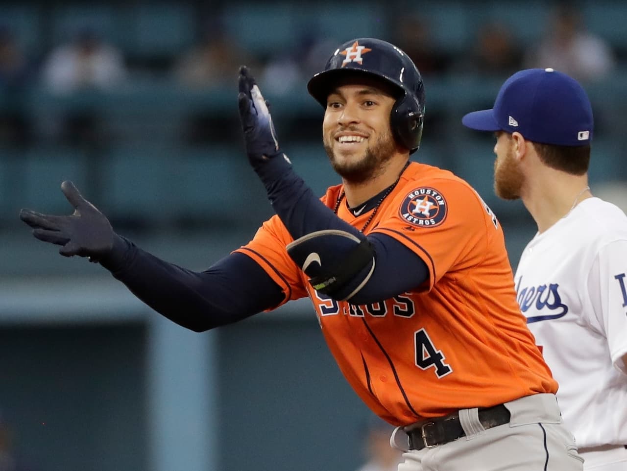Springer hizo un doblete y anotó por error del primera base Bellinger.