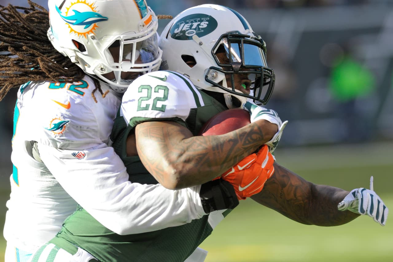 Los Jets continúan en la lucha por el comodín en la AFC al derrotar 38-20 a los Dolphins, checa las mejores tomas del partido.