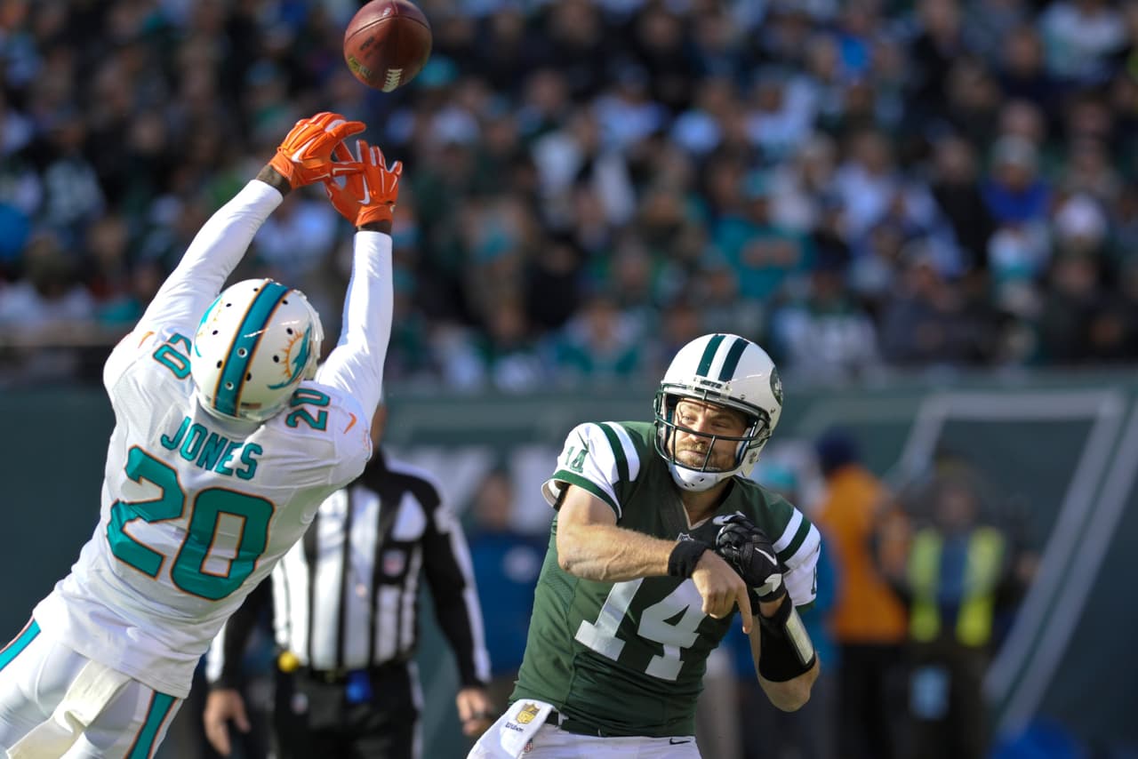 Los Jets continúan en la lucha por el comodín en la AFC al derrotar 38-20 a los Dolphins, checa las mejores tomas del partido.