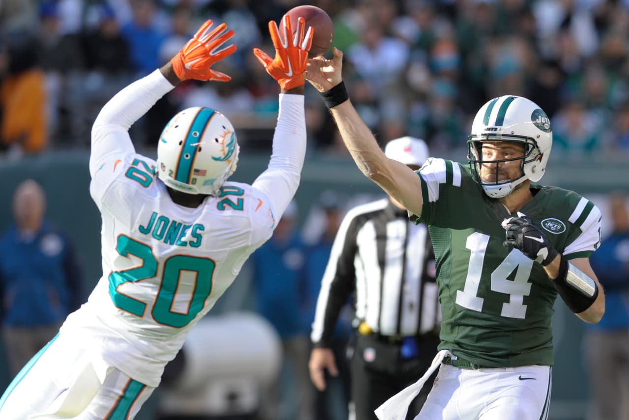 Los Jets continúan en la lucha por el comodín en la AFC al derrotar 38-20 a los Dolphins, checa las mejores tomas del partido.