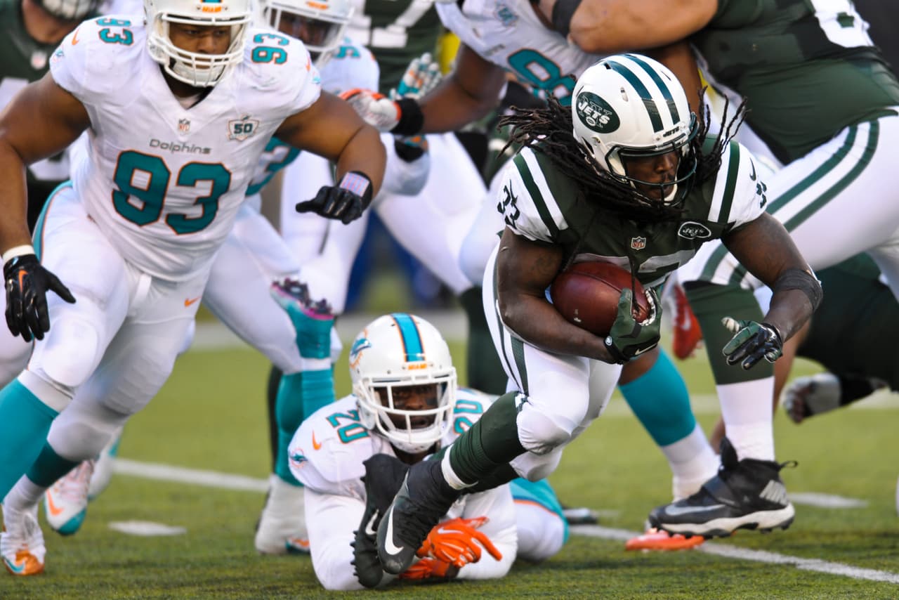 Los Jets continúan en la lucha por el comodín en la AFC al derrotar 38-20 a los Dolphins, checa las mejores tomas del partido.