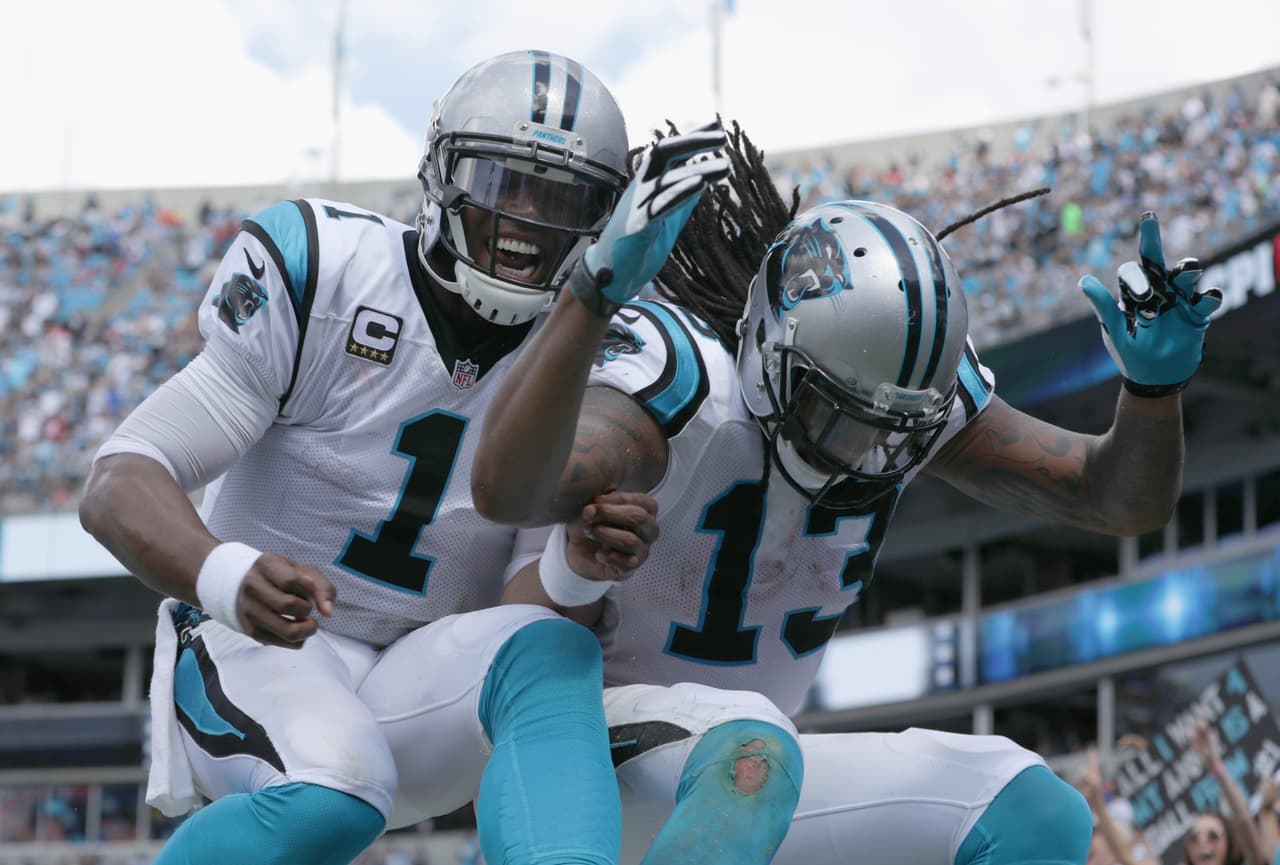 La celebración de Cam Newton con Kelvin Benjamin.