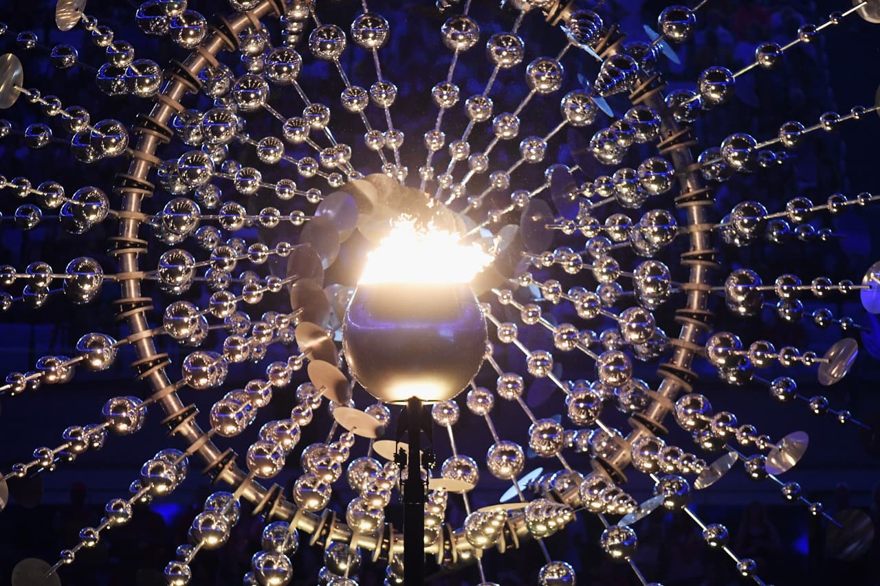 RIO DE JANEIRO, BRAZIL - SEPTEMBER 18: The Olympic flame burns thoughout the rain during the closing ceremony of the Rio 2016 Paralympic Games at Maracana Stadium on September 18, 2016 in Rio de Janeiro, Brazil. (Photo by Atsushi Tomura/Getty Images for Tokyo 2020)
