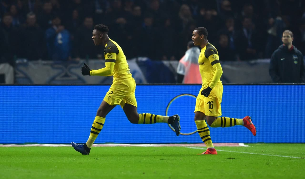 BERLIN, GERMANY - MARCH 16: Dan-Axel Zagadou and Manuel Akanji of Borussia Dortmund celebrate after scoring the 2:2 during the German Bundesliga match between Hertha BSC and Borussia Dortmund at the Olympiastadion on march 16, 2019 in Berlin, Germany. (Photo by City-Press via Getty Images)
