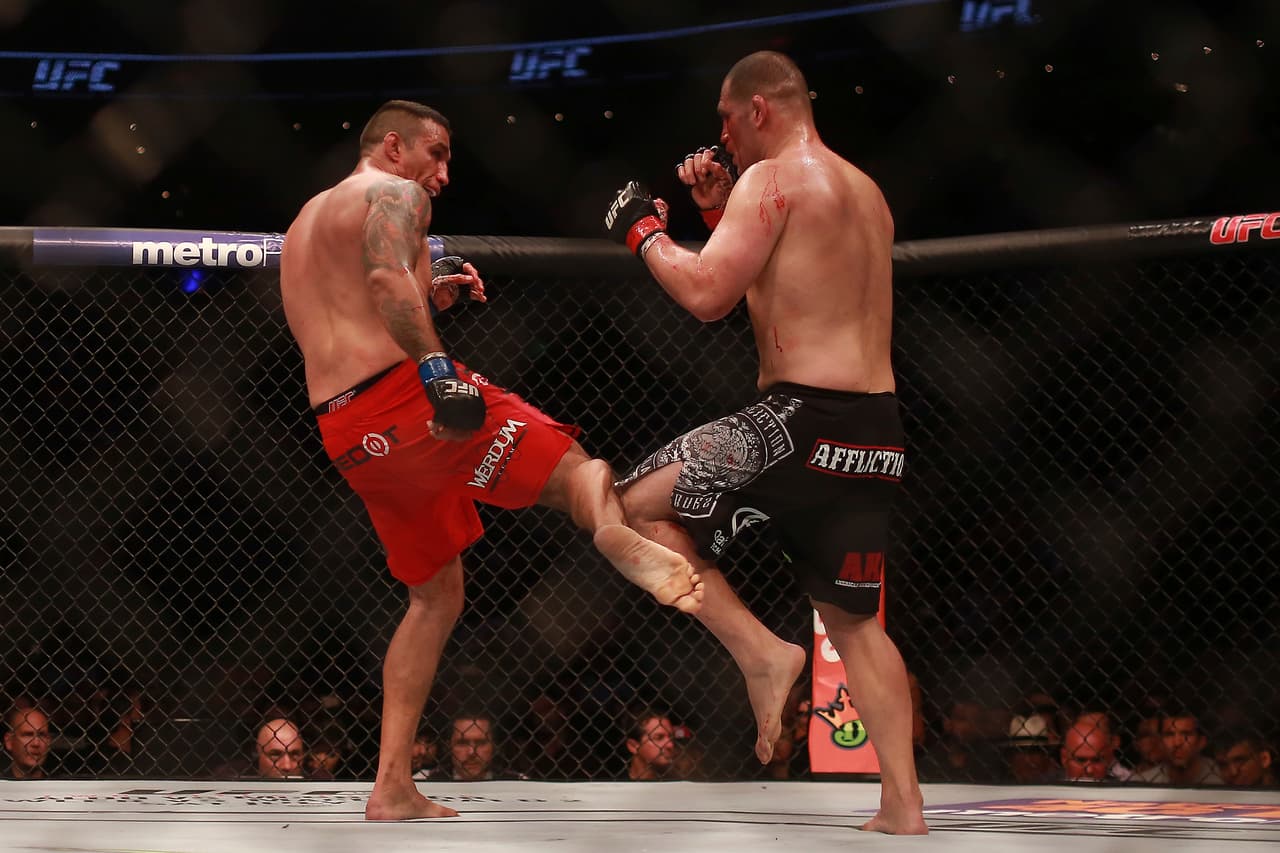 MEXICO CITY, MEXICO - JUNE 13: Cain Velasquez (R) fights against Fabricio Werdum (L) during a UFC Heavyweight Championship Fight between Cain Velasquez and Fabricio Werdum at Arena Ciudad de Mexico on June 13, 2015 in Mexico City, Mexico. (Photo by Manuel Velasquez/LatinContent/Getty Images)