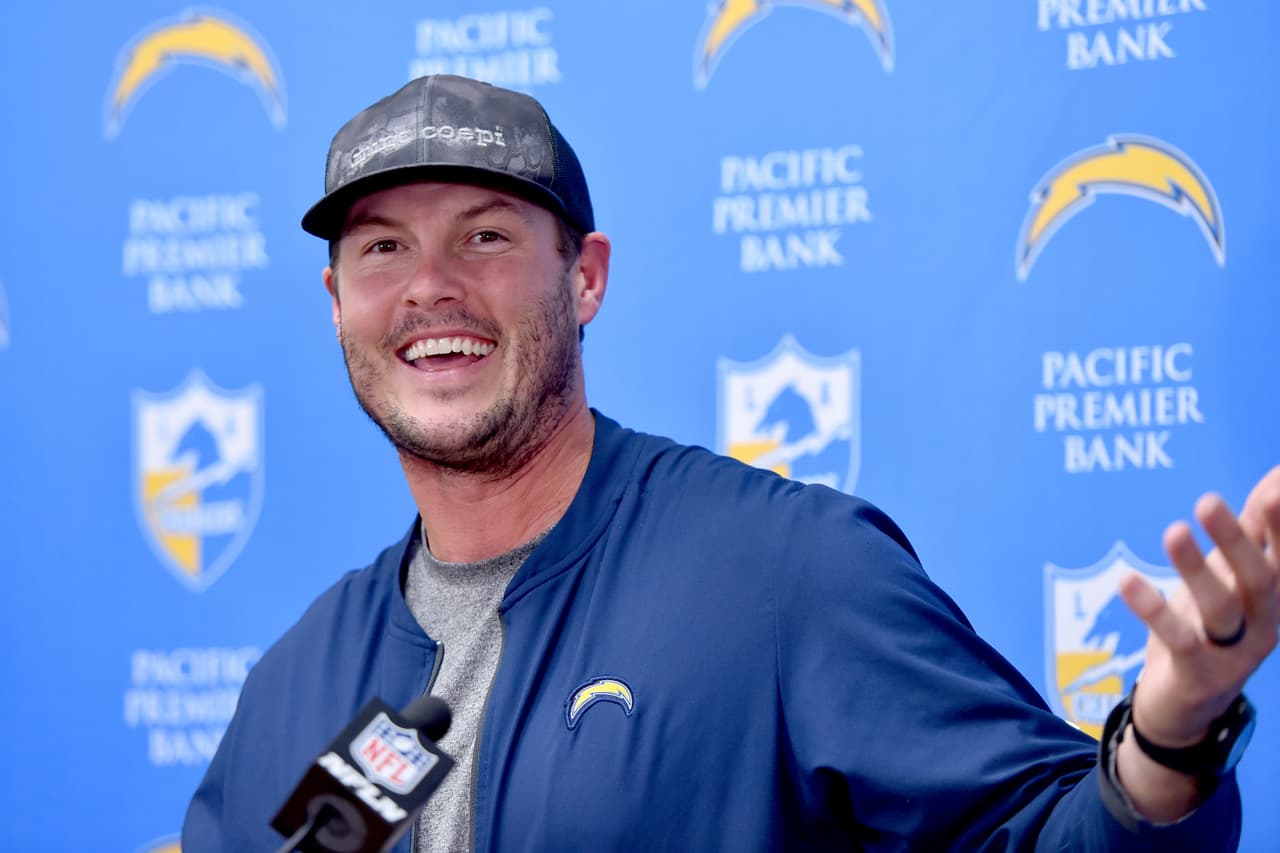Los Angeles Chargers quarterback Philip Rivers smiles at a news conference following an NFL football game between the Kansas City Chiefs and the Los Angeles Chargers in Kansas City, Mo., Sunday, Dec. 29, 2019. The Kansas City Chiefs won 31-21. (AP Photo/Ed Zurga)