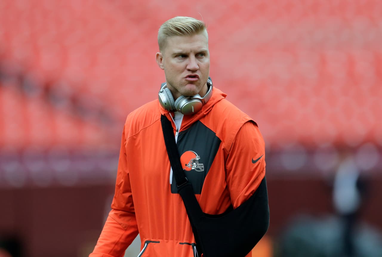 Injured Cleveland Browns quarterback Josh McCown (13) walks on the field before an NFL football game against the Washington Redskins, Sunday, Oct. 2, 2016, in Landover, Md. (AP Photo/Mark Tenally)
