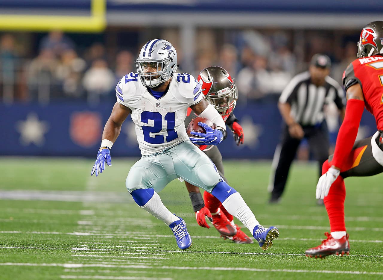 Dallas Cowboys running back Ezekiel Elliott (21) runs past Tampa Bay Buccaneers linebacker Lavonte David (54) during the 2016 NFL week 15 regular season game, Sunday, Dec. 18, 2016, in Arlington, Texas. The Cowboys defeated the Buccaneers, 26-20. (James D. Smith via AP)