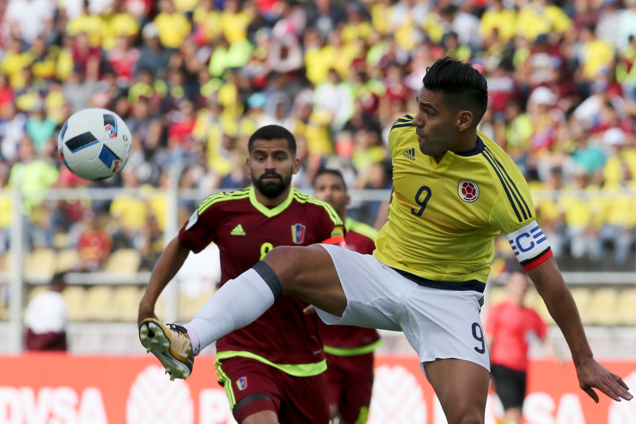 Colombia's Radamel Falcao Garcia plays the ball during a 2018 Russia World Cup qualifying soccer match against Venezuela in San Cristobal, Venezuela, Thursday, Aug. 31, 2017. (AP Photo/Fernando Llano)