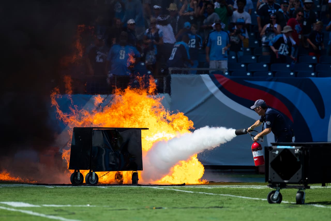 NASHVILLE, TN - SEPTEMBER 15: A failed pyrotechnic device bursts into flames before the game between the Tennessee Titans and the Indianapolis Colts at Nissan Stadium on September 15, 2019 in Nashville, Tennessee. (Photo by Brett Carlsen/Getty Images)