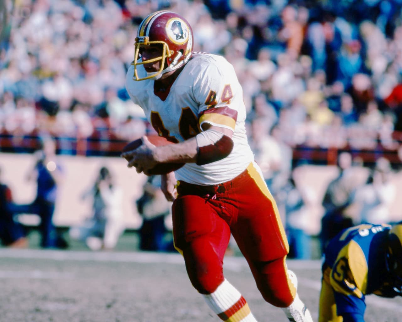 JOHN RIGGINS - Corredor Seleccionado por New York Jets en el Draft de 1971 durante la 1ª. Ronda, Pick 6. Jugó con los Jets hasta 1975. Cambiado a Washington Redskins en 1976 donde permaneció hasta 1985, ganó el Super Bowl XVII donde fue MVP.