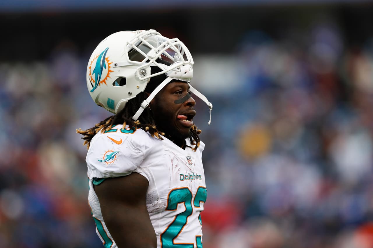 Miami Dolphins running back Jay Ajayi (23) walks to the sideline during an NFL football game against the Buffalo Bills on Saturday, Dec. 24, 2016, in Orchard Park, N.Y. Miami won 34-31 in overtime. (Aaron M. Sprecher via AP)