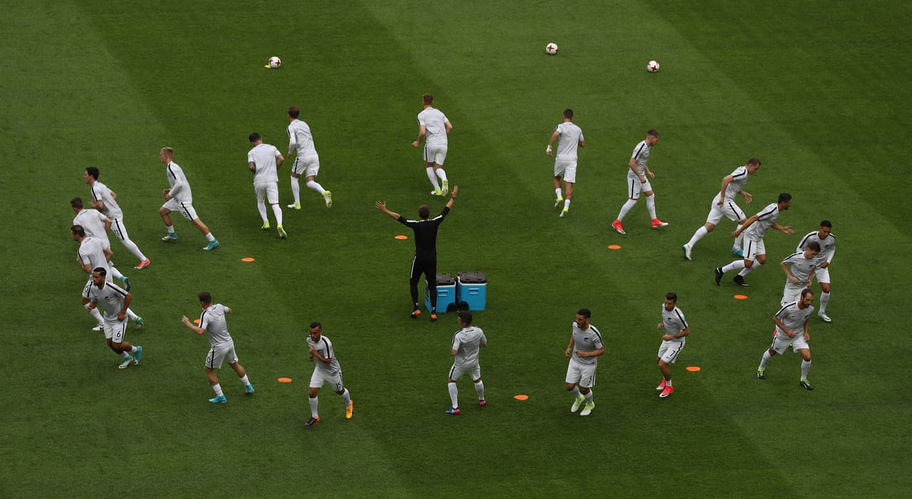 SAINT PETERSBURG, RUSSIA - JUNE 17: The New Zealand team warm up prior to the FIFA Confederations Cup Russia 2017 Group A match between Russia and New Zealand at Saint Petersburg Stadium on June 17, 2017 in Saint Petersburg, Russia. (Photo by Francois Nel/Getty Images)