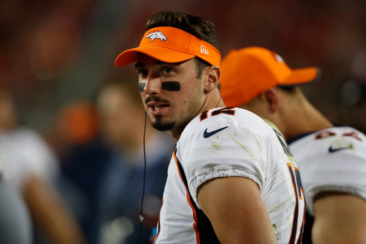 Denver Broncos quarterback Paxton Lynch (12) is seen on the sideline during an NFL preseason football game against the San Francisco 49ers, Saturday, Aug. 19, 2017, in Santa Clara, Calif. The Broncos defeated the 49ers 33-14. (Ryan Kang via AP)