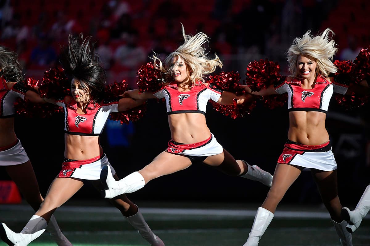 Atlanta Falcons cheerleaders perform during the first half of an NFL preseason football game between the Atlanta Falcons and the Kansas City Chiefs, Friday, Aug. 17, 2018, in Atlanta. (AP Photo/John Amis)