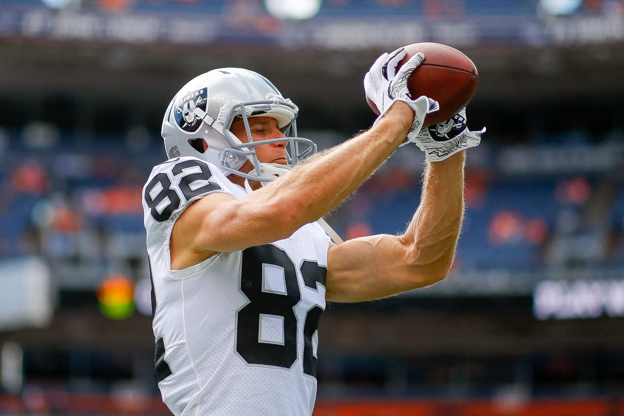 Wide receiver Jordy Nelson #82 of the Oakland Raiders catches a ball as he warms up before a game against the Denver Broncos at Broncos Stadium at Mile High on September 16, 2018 in Denver, Colorado.