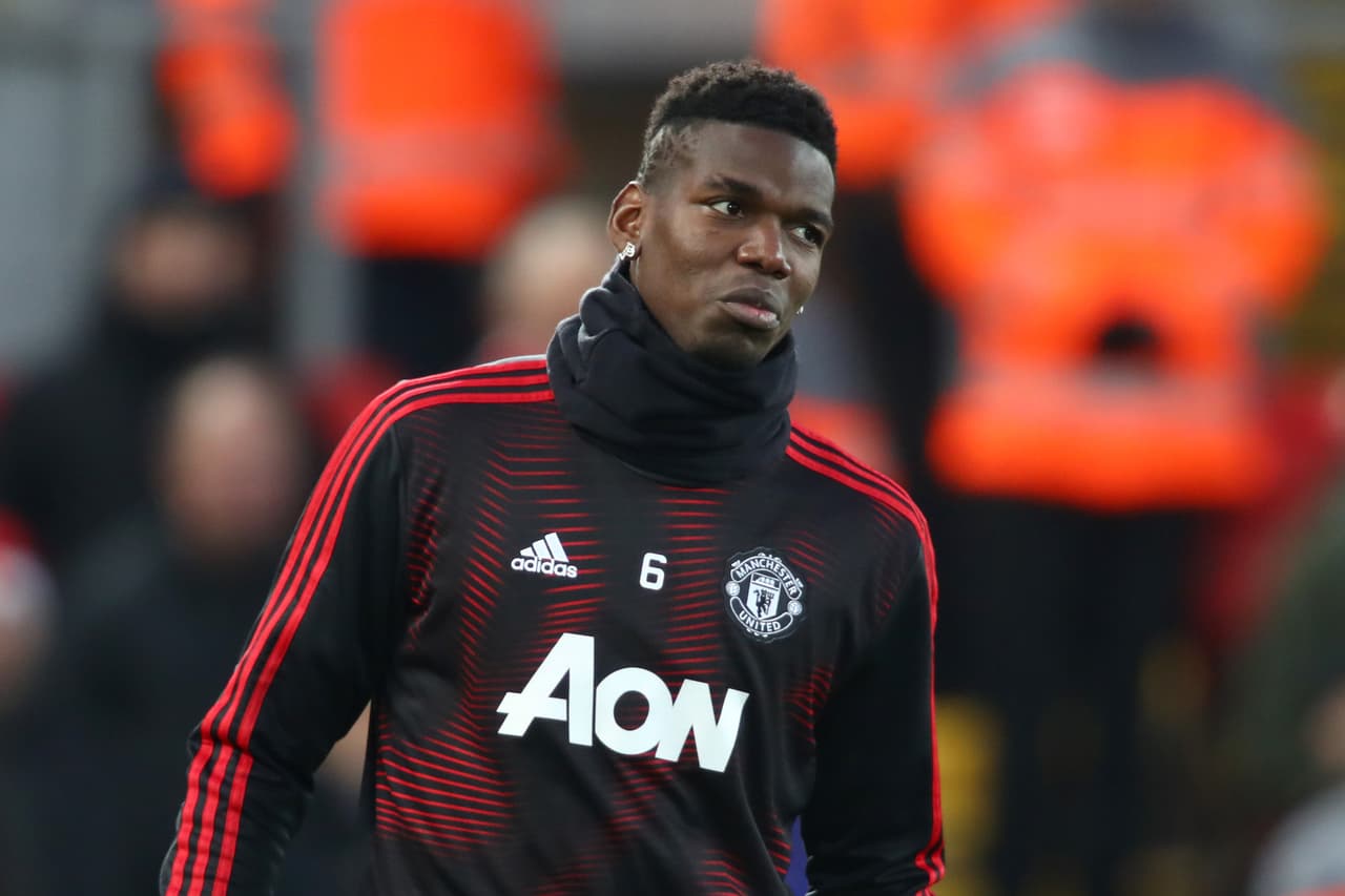 LIVERPOOL, ENGLAND - DECEMBER 16: Paul Pogba of Manchester United looks on when warming up prior to the Premier League match between Liverpool FC and Manchester United at Anfield on December 16, 2018 in Liverpool, United Kingdom. (Photo by Clive Brunskill/Getty Images)