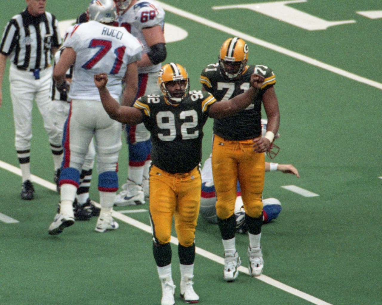 Ala defensivo - Reggie White (Green Bay Packers) [Super Bowls XXXI (Ganador), XXXII (Perdedor)]