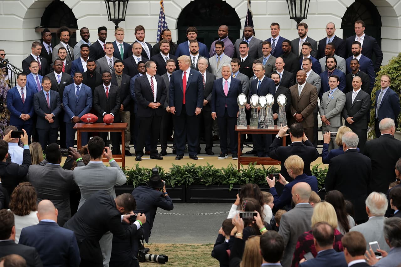 WASHINGTON, DC - APRIL 19: U.S. President Donald Trump poses for photographs with the New England Patriots during a celebration of the team's Super Bowl victory on the South Lawn at the White House April 19, 2017 in Washington, DC. It was the team's fifth Super Bowl victory since 1960. (Photo by Chip Somodevilla/Getty Images)