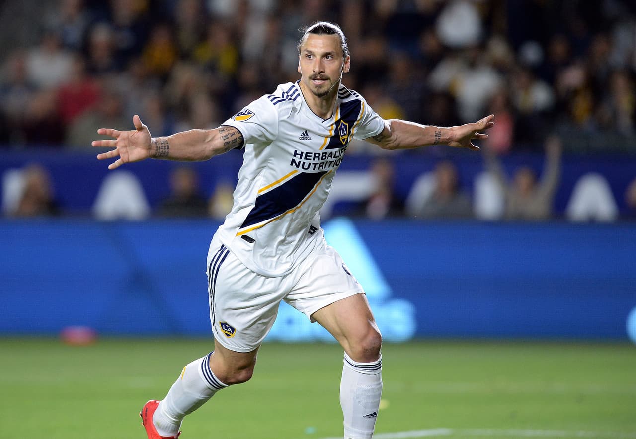 April 28, 2018; Carson, CA, USA; Los Angeles Galaxy forward Zlatan Ibrahimovic (9) reacts to a goal scored against the New York Red Bulls during the second half at StubHub Center. The goal would be disallowed due to offsides. Mandatory Credit: Gary A. Vasquez-USA TODAY Sports