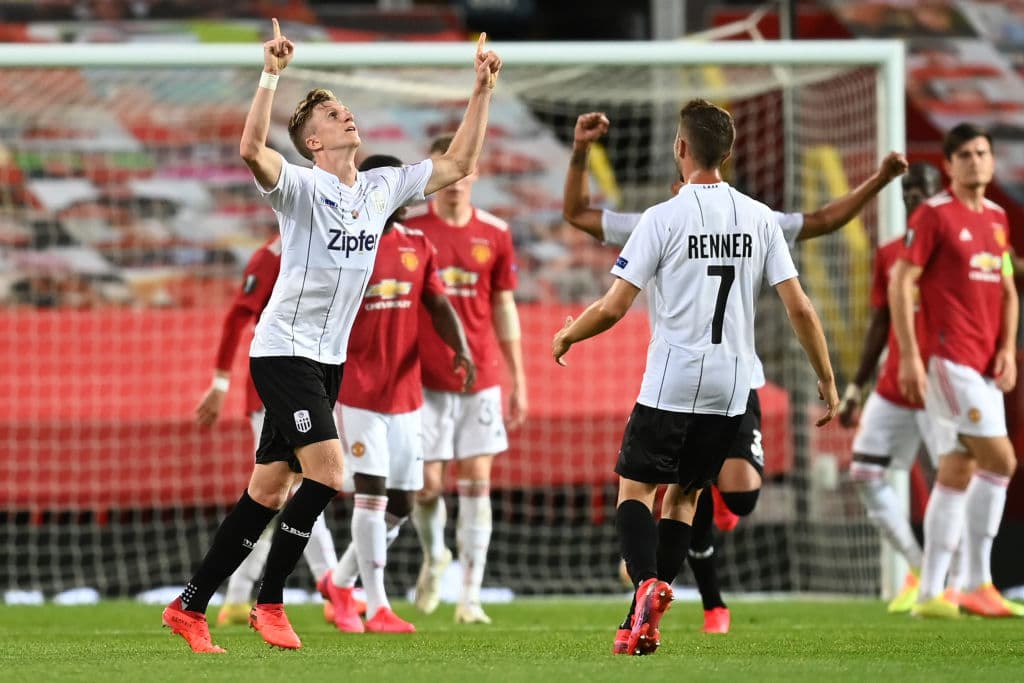 Ya en la parte complementaria, Philipp Wiesinger (55’) aprovechó un rebote de tiro de esquina para prender el esférico con un derechazo dejando sin posibilidad a Romero, el arquero argentino.