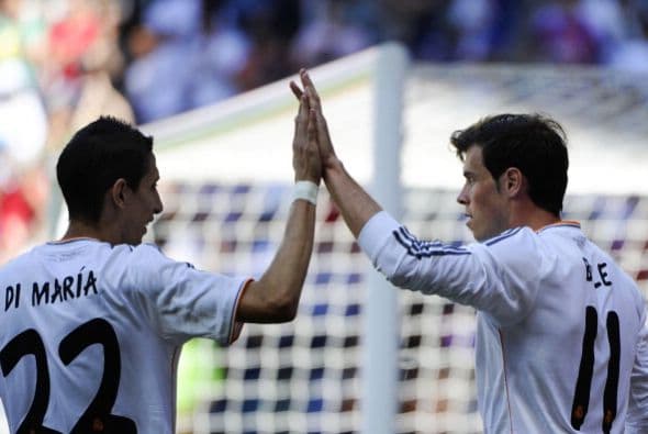Gareth Bale celebra su gol con Di María.