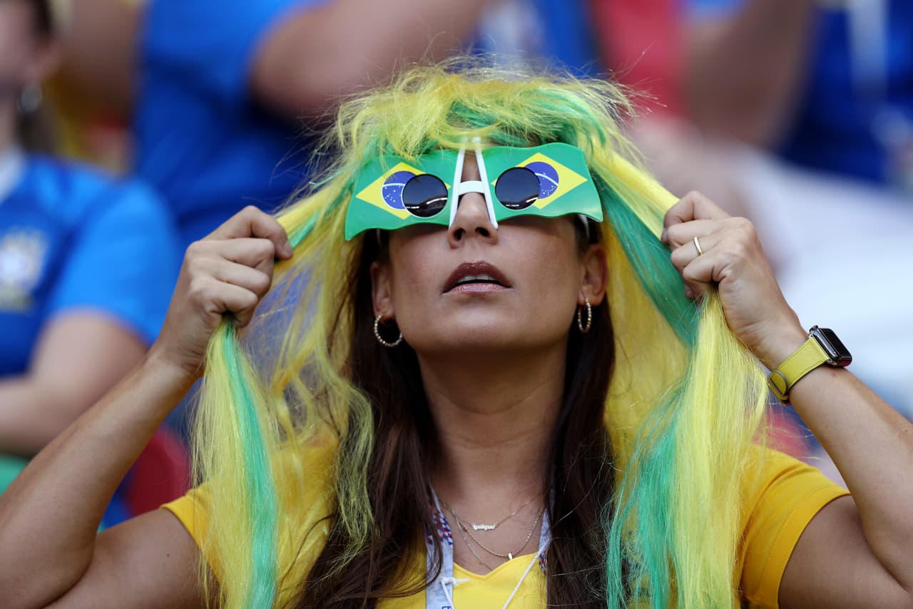 KAZAN, RUSSIA - JULY 06: A Brazil fan enjoys the pre match atmosphere prior to the 2018 FIFA World Cup Russia Quarter Final match between Brazil and Belgium at Kazan Arena on July 6, 2018 in Kazan, Russia. (Photo by Buda Mendes/Getty Images)